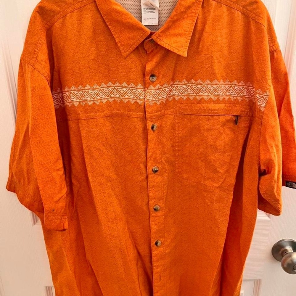 The North Face Orange button-up shirt with a boho vibe
